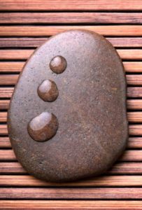 Massage aux pierres chaudes