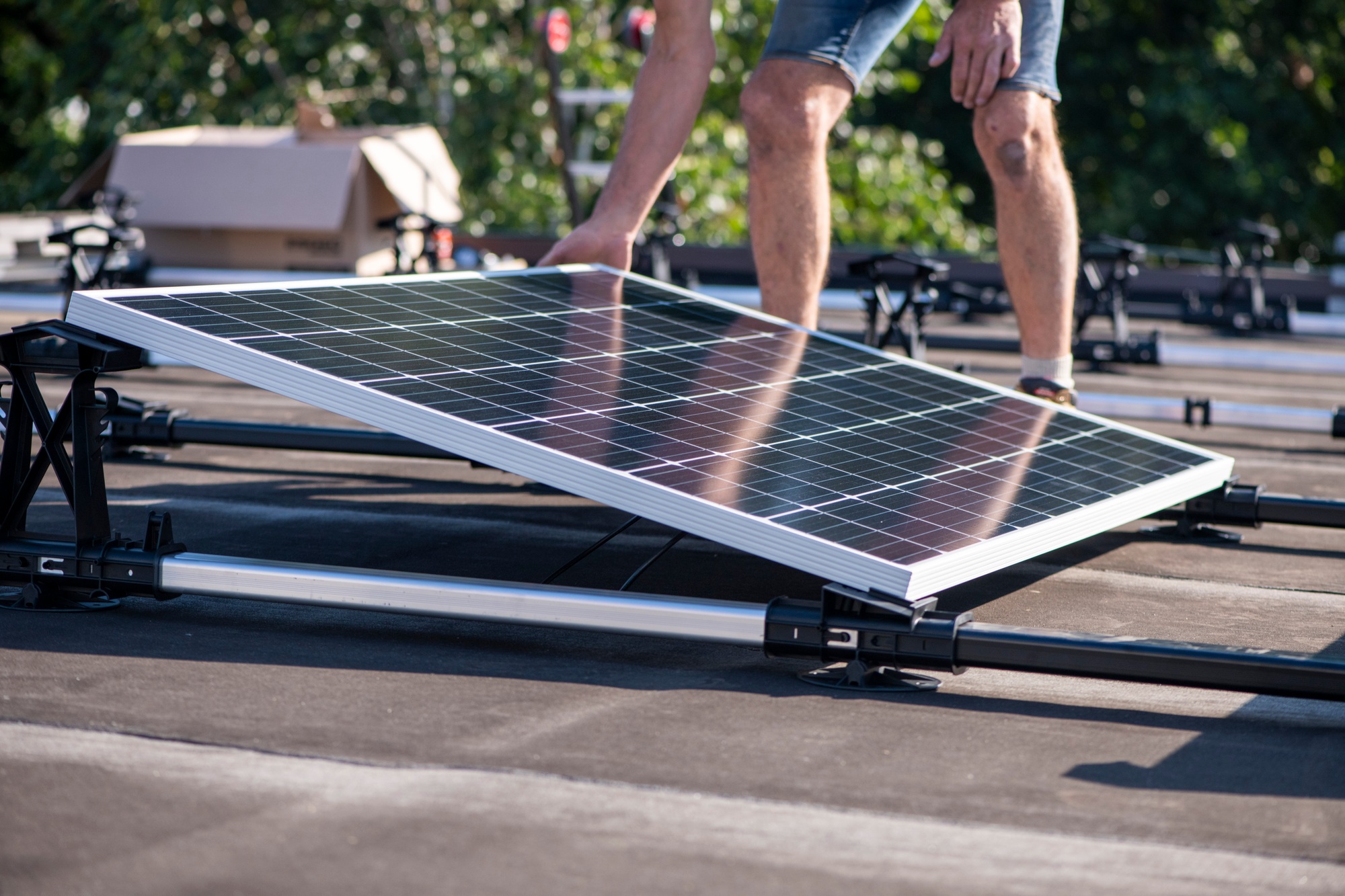 Installation of a new solar panel on a rooftop